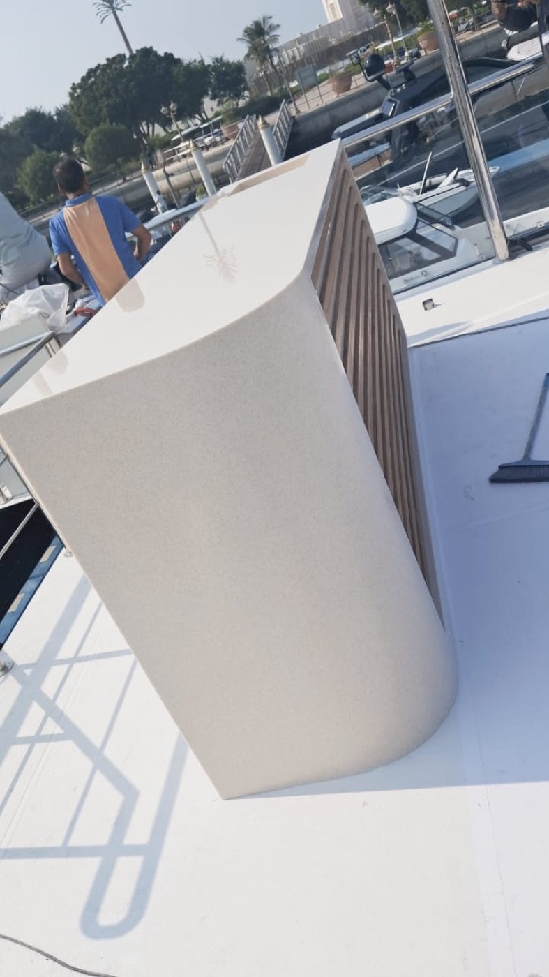 Curved solid-surface counter fabricated for a marina and yacht project