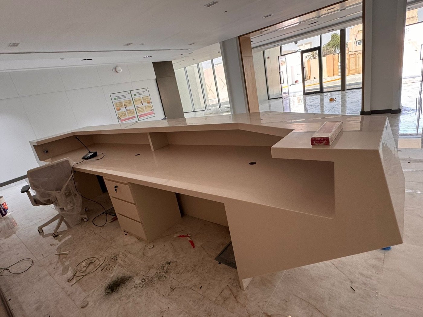 Sculptural Corian reception desk fabricated and installed for an office in the UAE