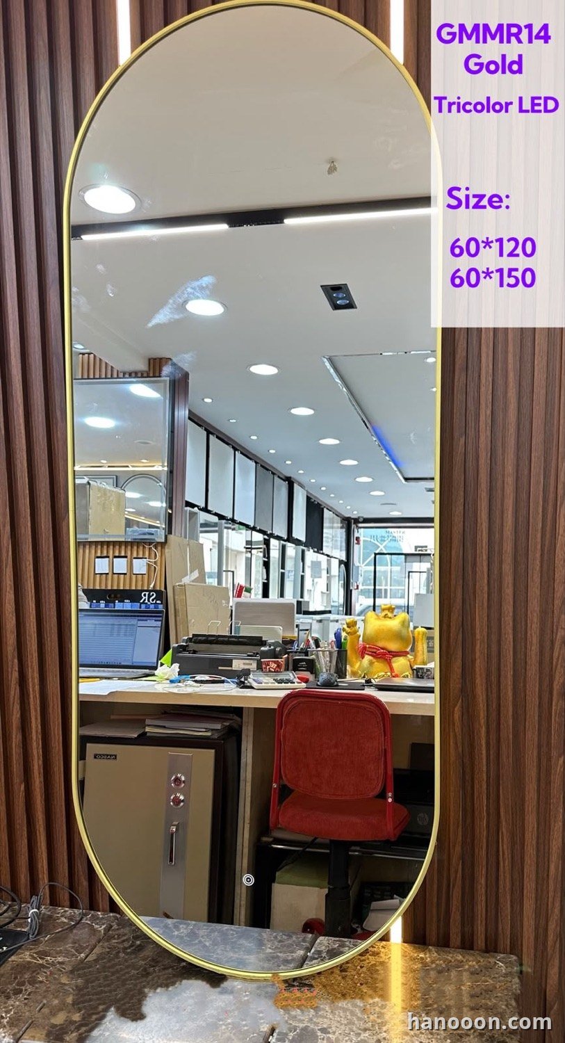 Custom glass and mirror work by Hanooon — backlit LED mirror, etched or fluted glass, completed installation Abu Dhabi UAE
