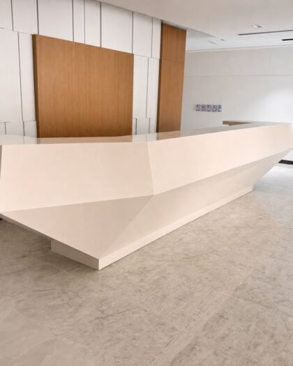 Corian Reception & Office Desks — Corian solid surface, supplied and installed in Abu Dhabi by Hanooon
