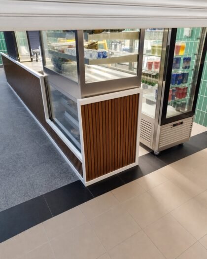 Corian Retail & Commercial Counters — Corian solid surface, supplied and installed in Abu Dhabi by Hanooon