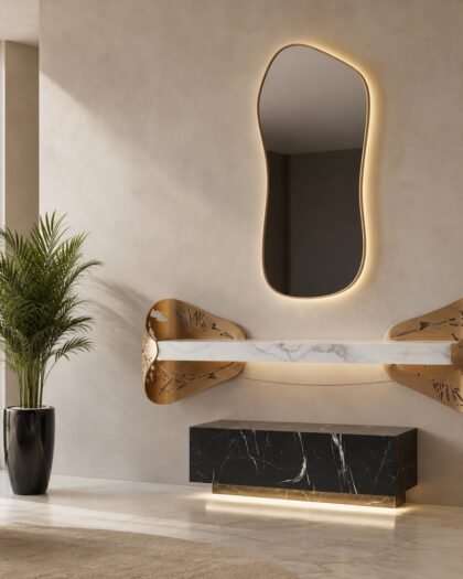 Sculptural gold entrance console with organic LED mirror — handcrafted in the UAE