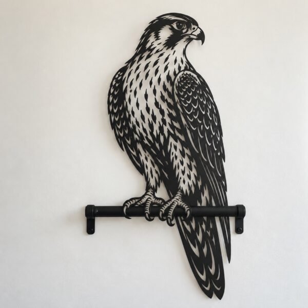 Matte black laser-cut steel Arabian falcon wall art on a plain white wall.