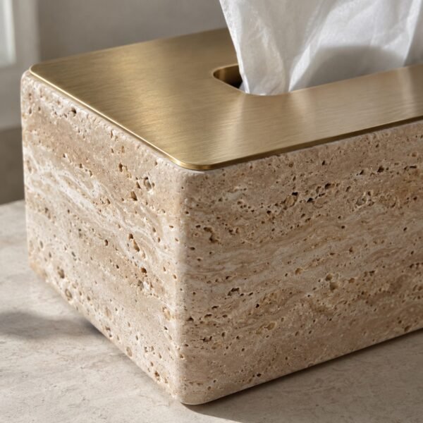 Travertine and satin gold rectangular tissue box cover on a plain light background
