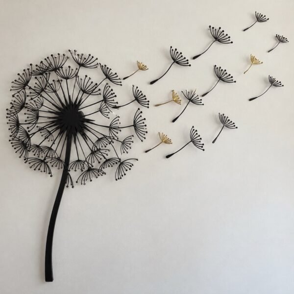 Dandelion burst wall art in matte black laser-cut steel with a few gold seeds on an off-white wall