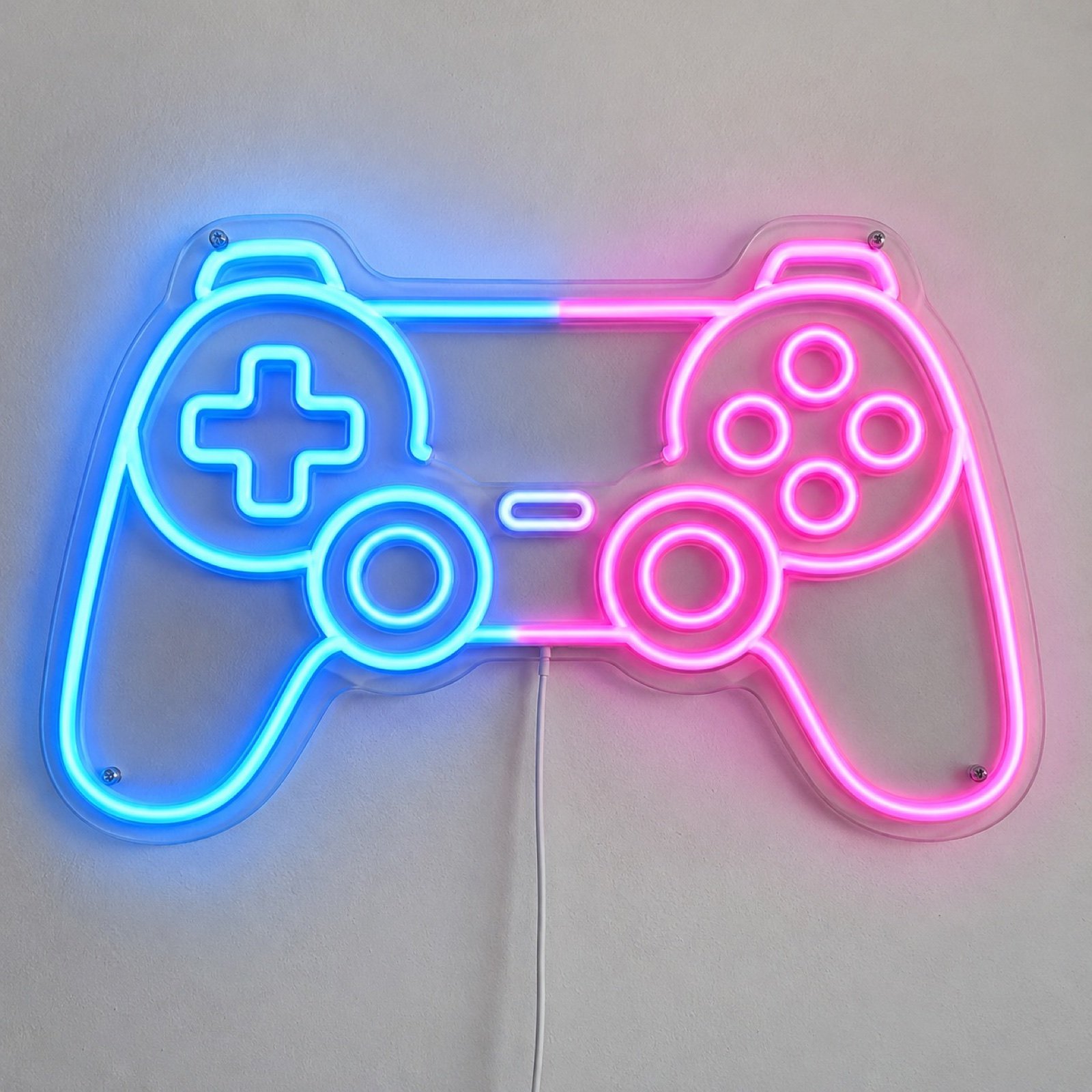 Blue and pink gaming controller outline neon sign on a plain white wall.