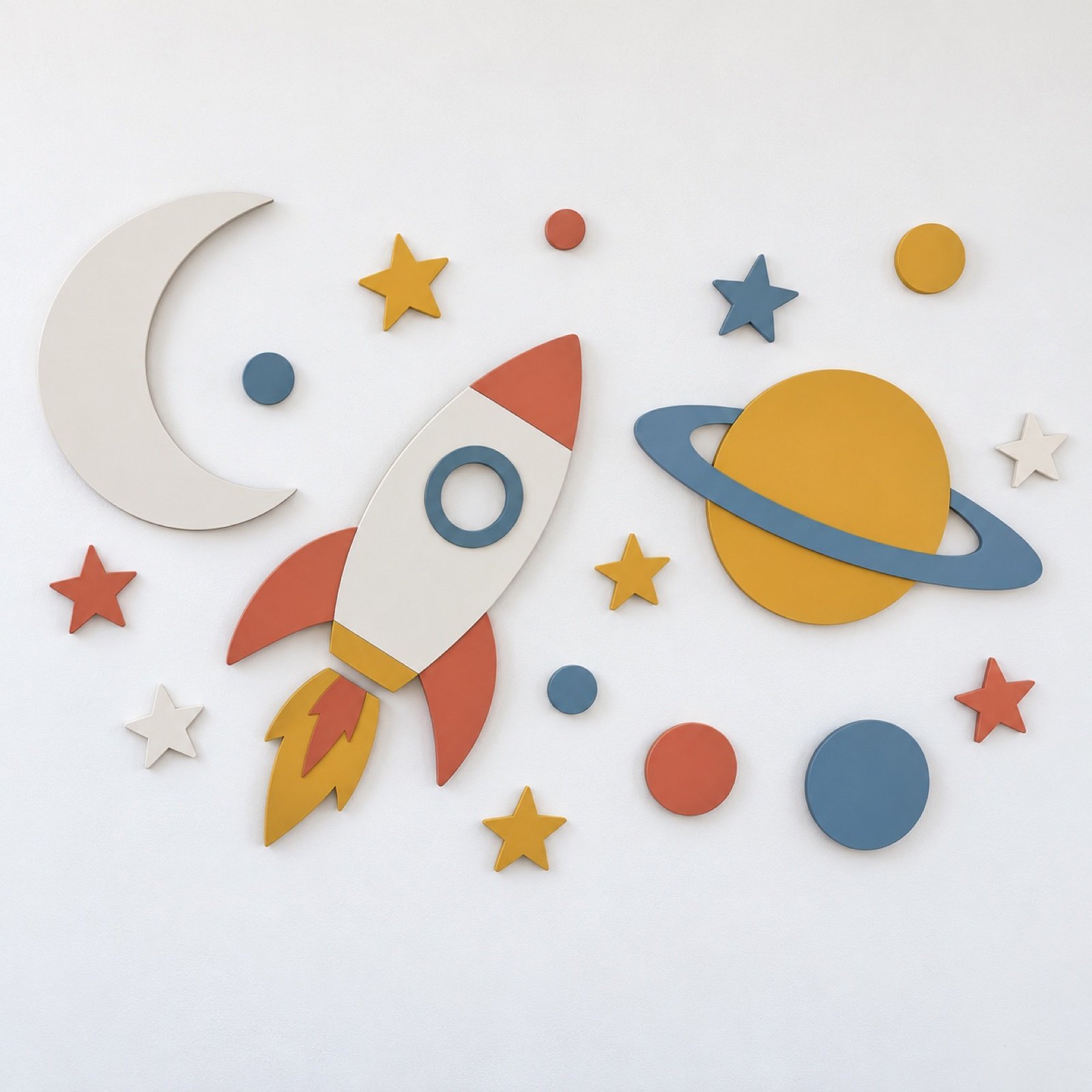 Space rocket and planets laser-cut steel wall set on a plain white wall