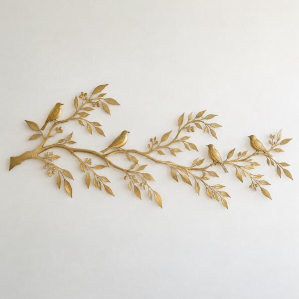 Gold PVD steel Ghaf Branch with Birds wall sculpture on a plain white wall, front view.