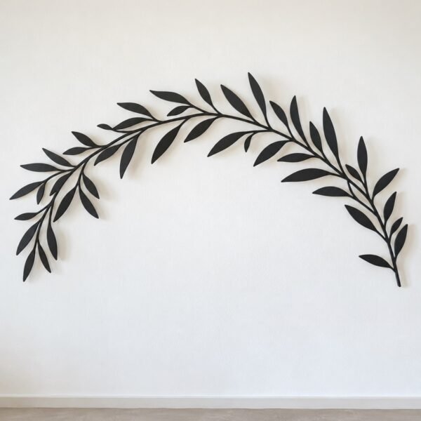 Olive Branch Arc wall decor in matte black laser-cut steel on a plain white wall.