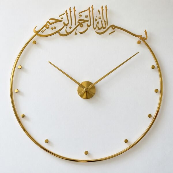 N027 70 cm mirror-gold PVD steel Basmalah open-frame wall clock on a white wall