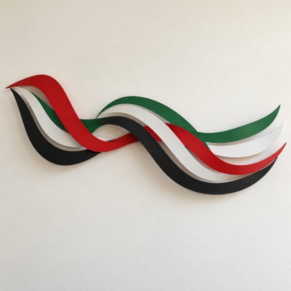 UAE flag-colour layered steel ribbon wall art on a plain white wall, front view.