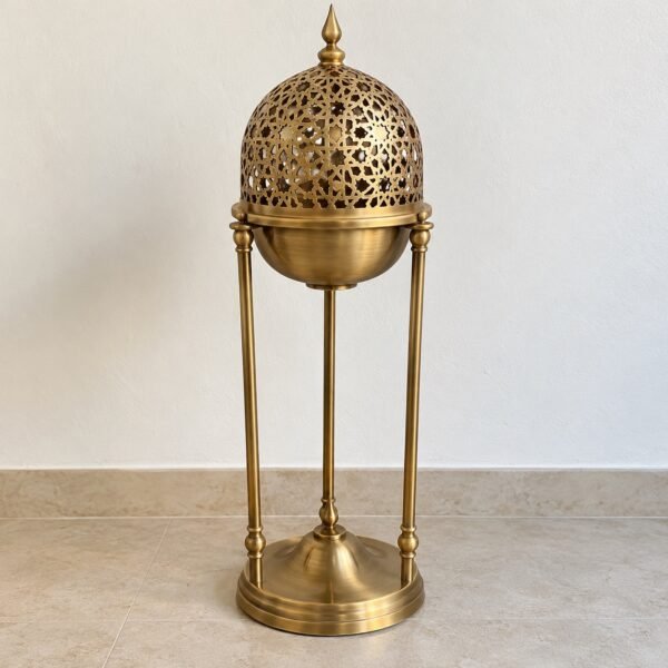 Front view of the 45 cm N067 brass-gold domed bakhoor stand on a light neutral floor.