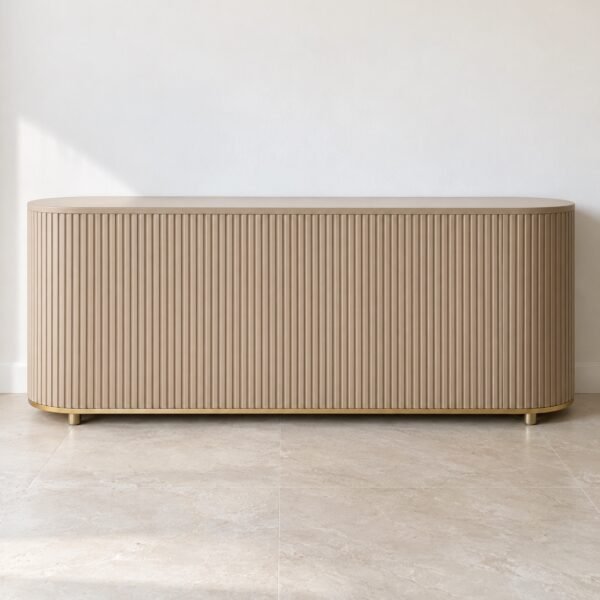 Front view of the HANOOON N071 sand-lacquer fluted console with curved ends and a thin brass line against a plain light wall.