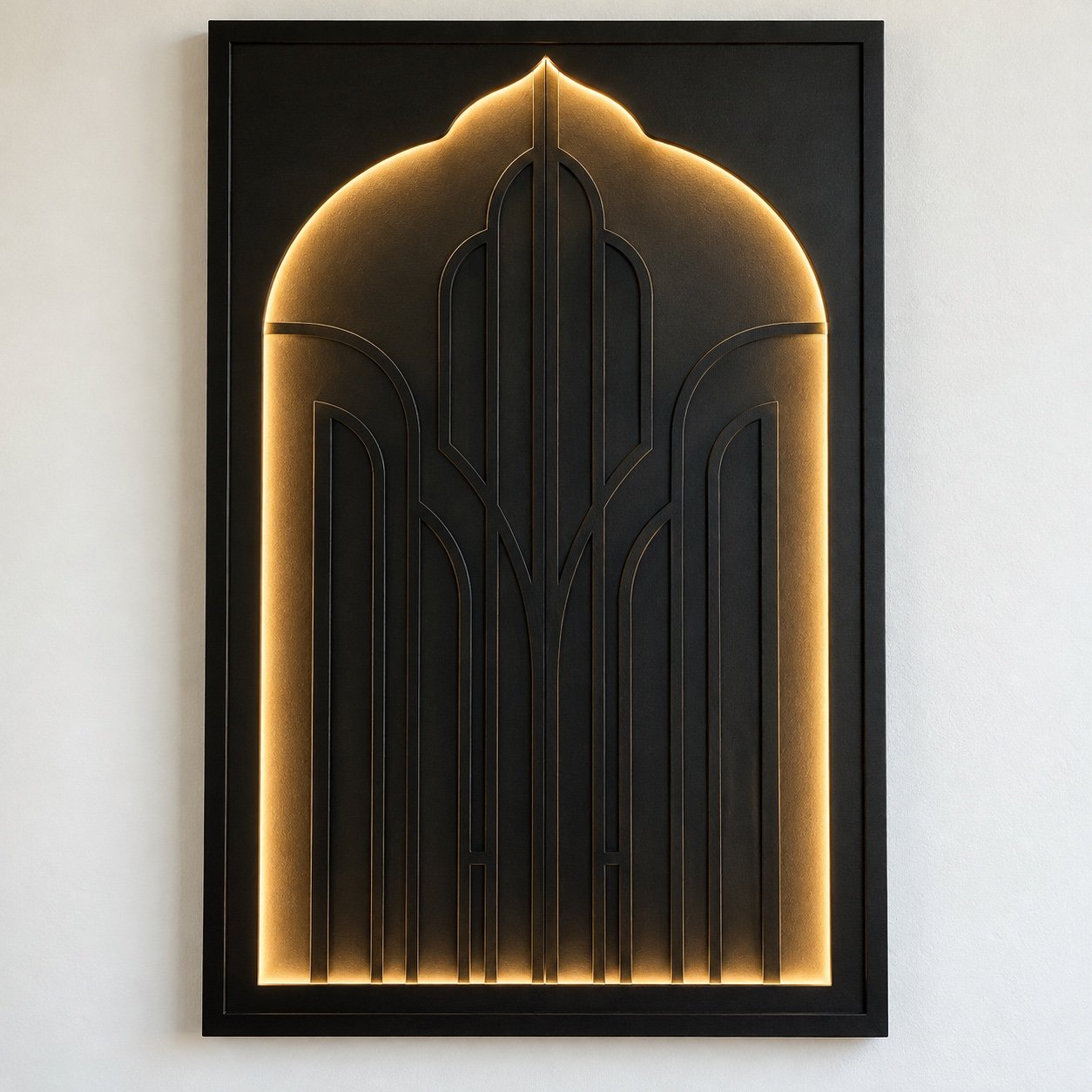 Musalla Calligraphy Light Panel in matte black steel with a warm LED mihrab outline on a white wall.