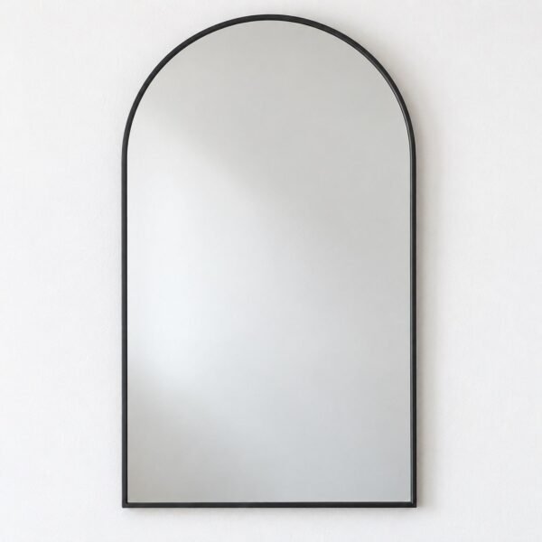 Sadaf arch wall mirror with slim dark charcoal metal frame on a plain white wall.