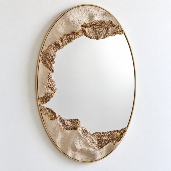 Sahra oval wall mirror with a slim champagne-gold rim on a plain white wall