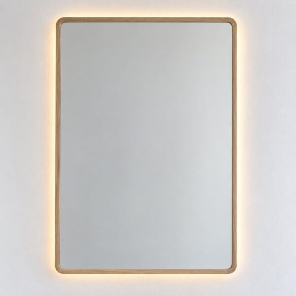 Riwa warm natural oak rectangular LED wall mirror on a plain white wall