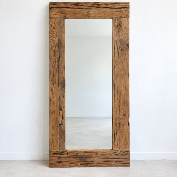 Nahla tall rectangular leaner mirror with a warm natural-brown reclaimed wood frame against a white wall