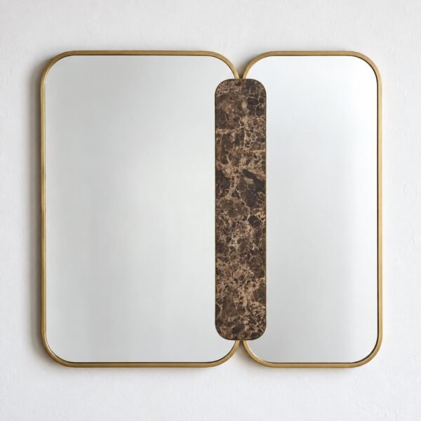 Mira Veya Bridge wall mirror with two rounded rectangular panels, warm-gold edging, and a dark brown marble centre on a white wall.