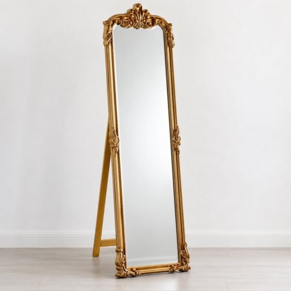 Zahra ornate antique-gold rectangular leaner mirror standing against a plain white wall.