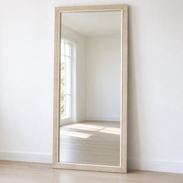 Saha tall rectangular leaner mirror with a warm ivory-beige textured wood frame against a plain white wall.