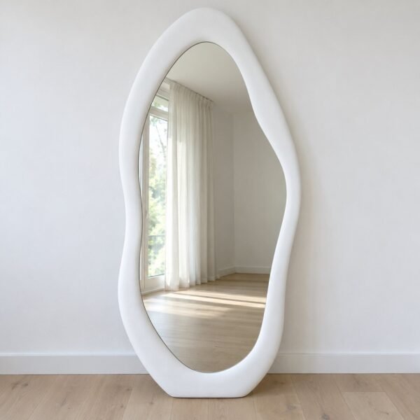 Noor organic floor mirror with a thick matte white frame against a plain white wall.