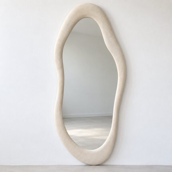 Noor warm ivory organic arch wall mirror on a plain white wall