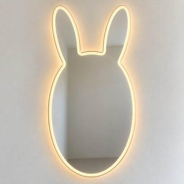 Front view of the frameless UAE Bunny Ears LED Mirror with a plain oval face, two rounded ears, and a soft illuminated LED outline on a white wall.