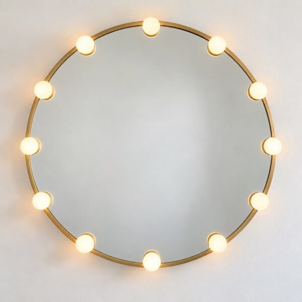 Round 70 cm Hollywood vanity mirror with 12 warm bulbs and a slim gold ring on a white wall.