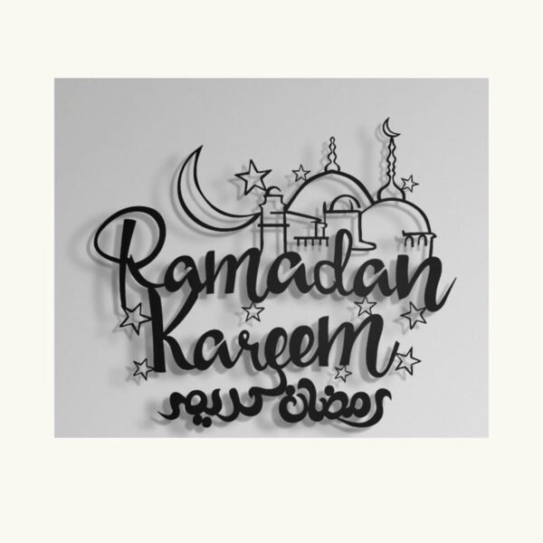 Black Ramadan Kareem metal wall art with Arabic calligraphy, crescent, mosque domes and stars on a warm-white wall.