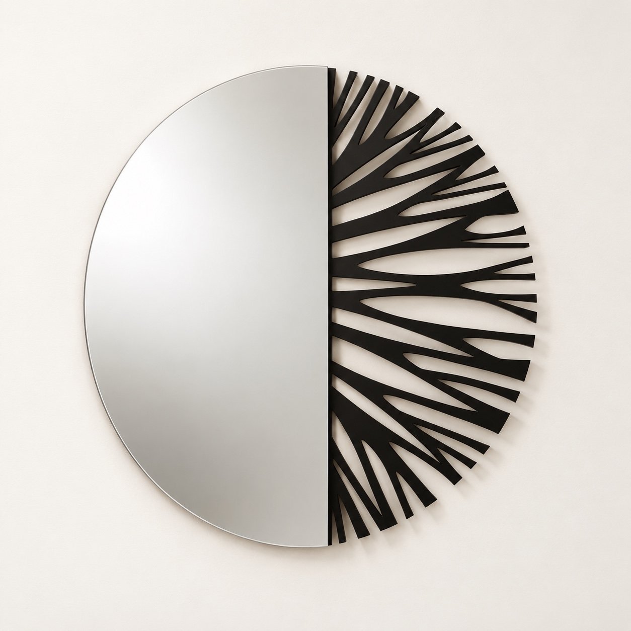 Branches Wall Mirror with a clear half-round mirror and black branching metal section on a warm-white wall.