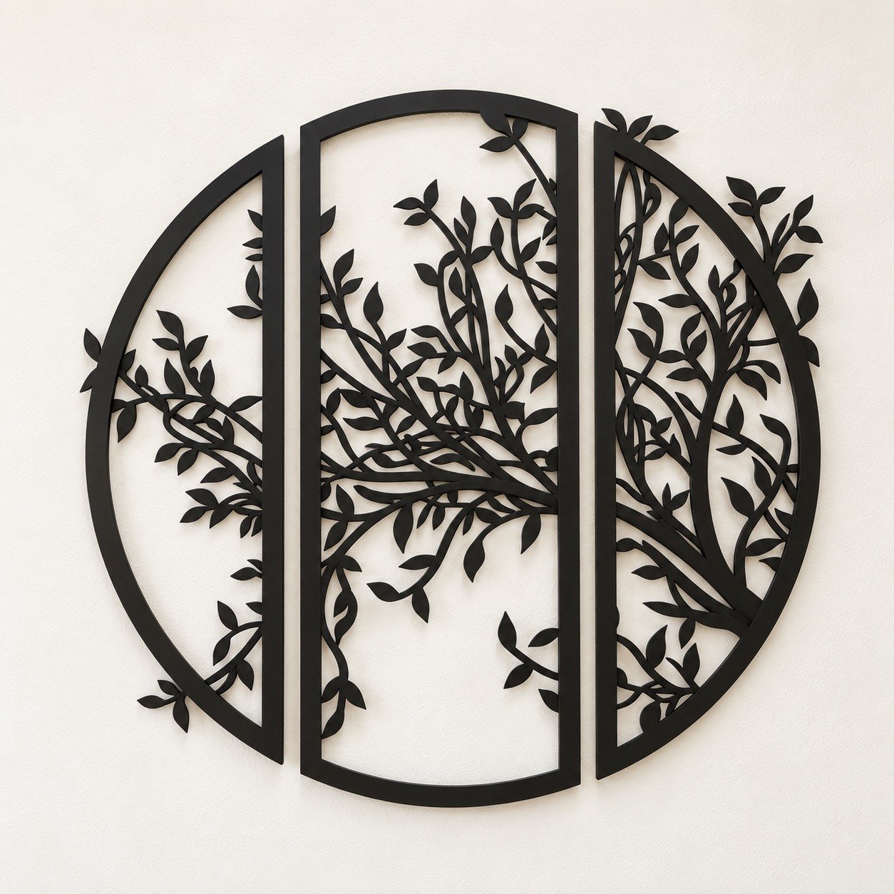 Three-piece black metal tree wall art set on a plain warm-white wall, front view.