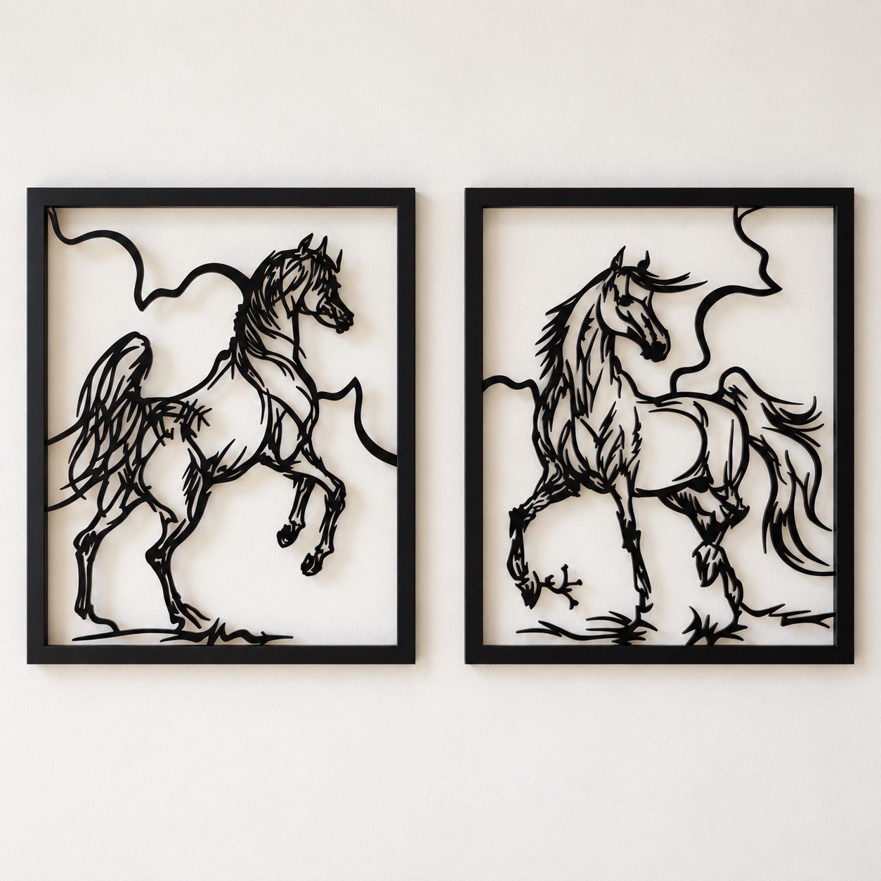 Two-piece black metal horses wall art set displayed straight-on on a plain warm-white wall.
